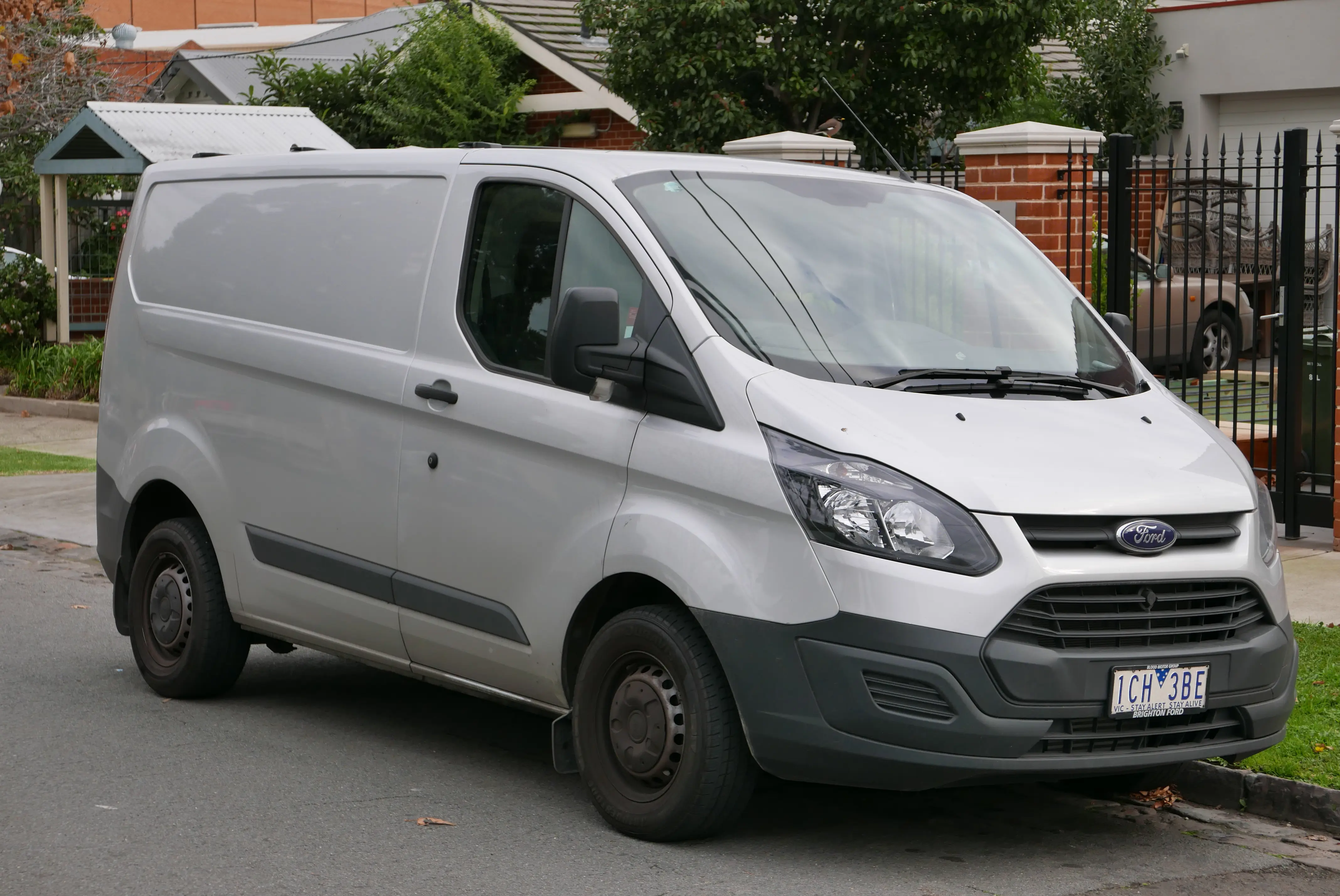 Silver Ford Transit Custom work van parked on a suburban street in Alphington, Melbourne